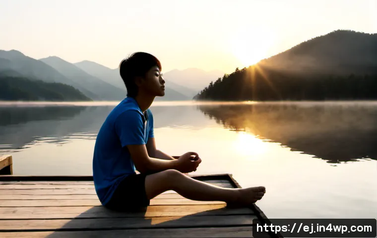 마인드풀니스 실천을 통해 얻는 인사이트 - Photorealistic sunrise scene of a young adult seated cross-legged on a quiet lakeside wooden dock, e...